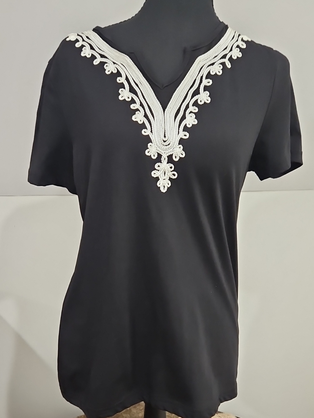 R•Q•T Women’s Black V-Neck Top with White Lace Trim. Size S